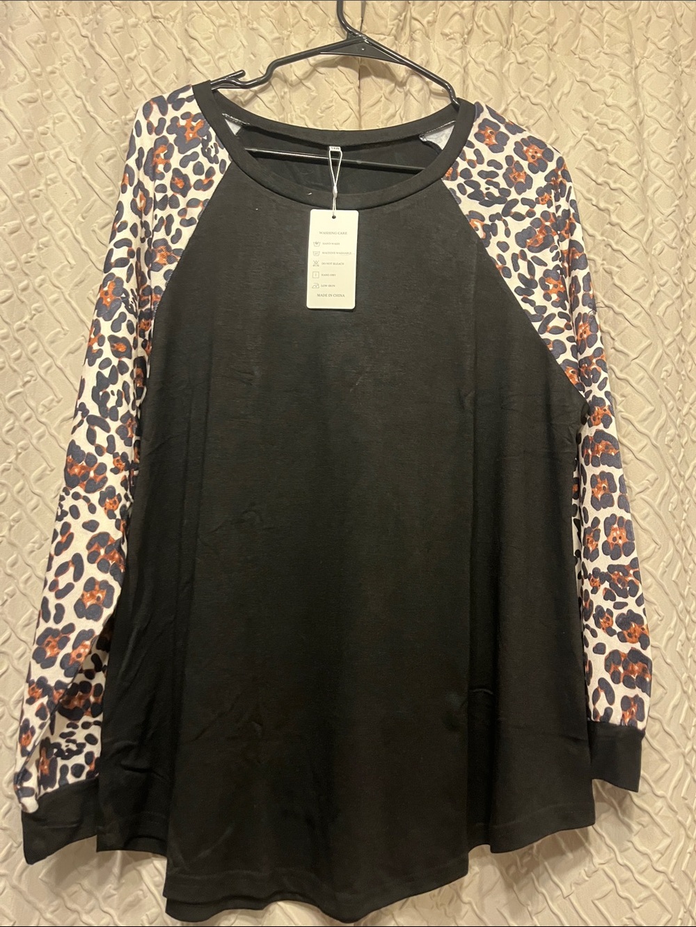 Black Raglan Long-Sleeve Top with Leopard Print Sleeves - Women